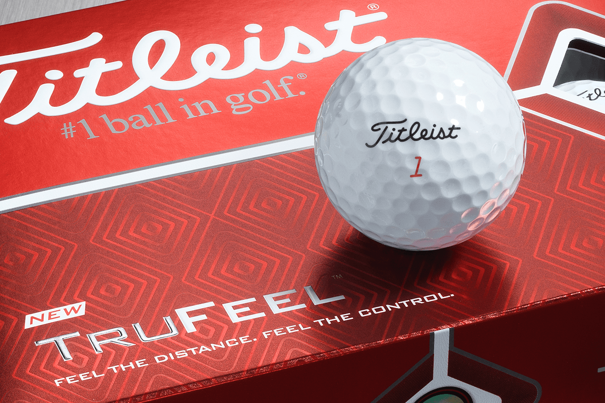 Piłki golfowe Titleis TruFEEL białe (tuzin) 